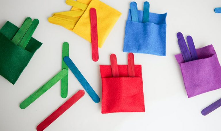 Colorful felt pockets and popsicle sticks