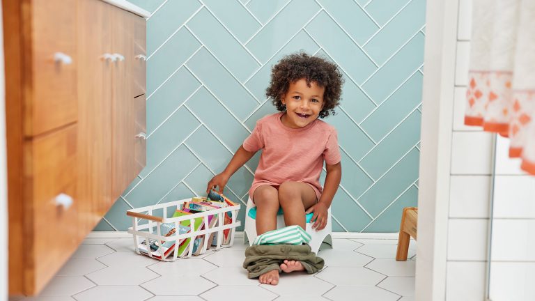 Child sitting on a potty.