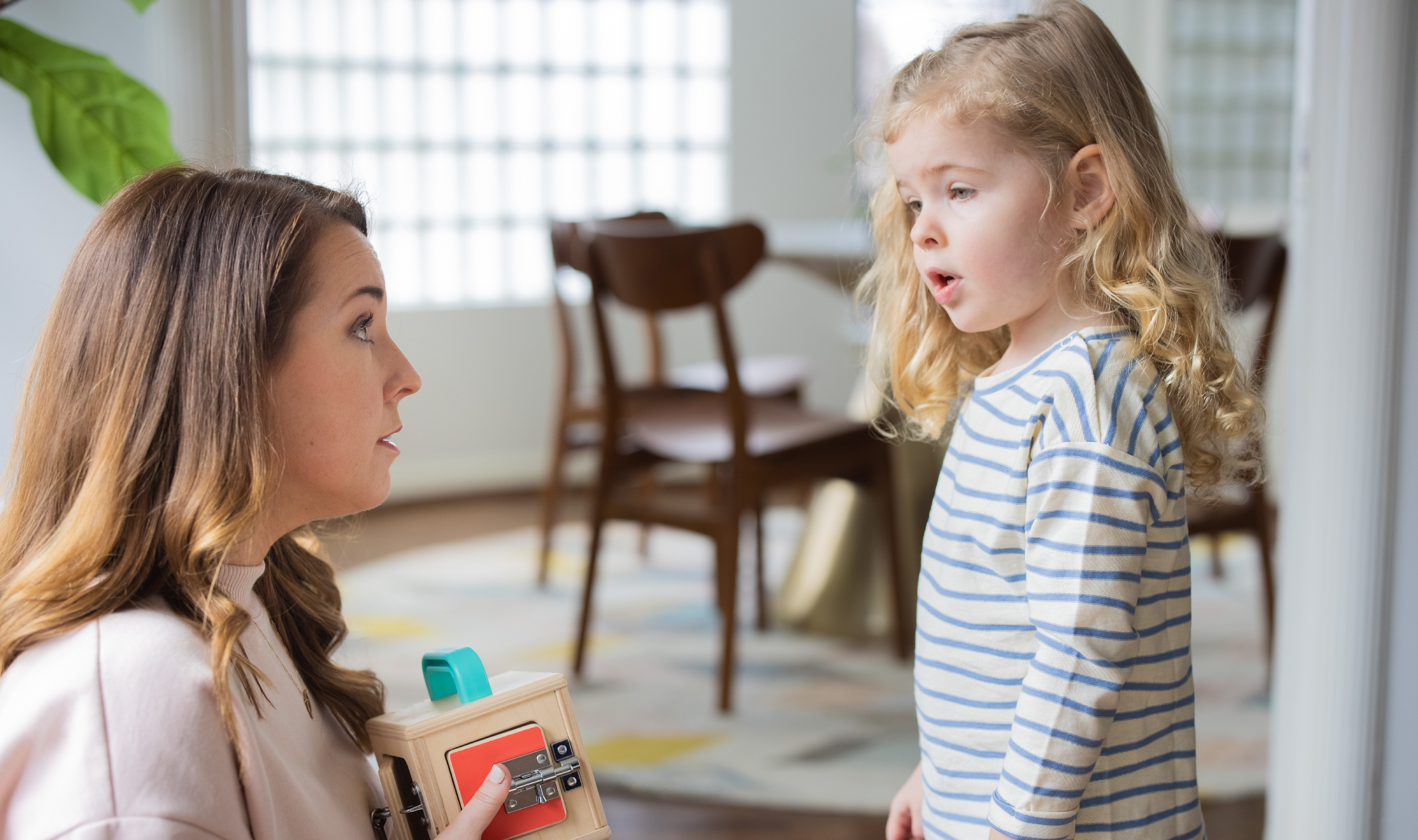 Parent listens to her child's side of the story.