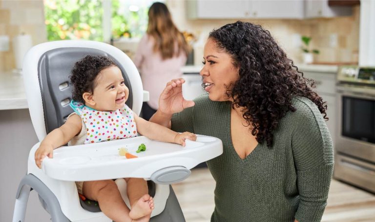 Mom uses gestures to communicate with her baby